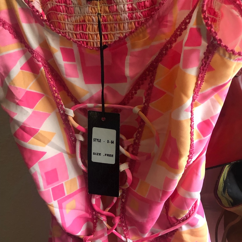 Flare out pretty dress with tags very cute says one size fits all